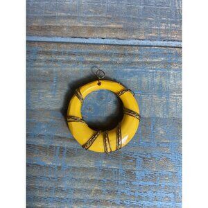 Vintage Yellow Circular Pendant With Metal Wire Wrap Design